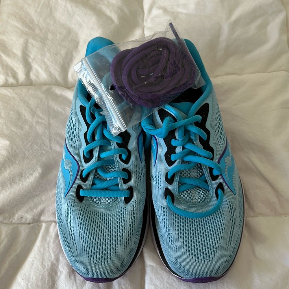 Brand new Saucony Ride 14 running shoes.  Size 7.